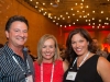 3-People-At-Corporate-Event-In-Texas-With-Lights-Blurred