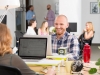 Commercial Photography Guy At Laptop In Office