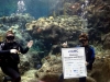 Corporate-Event-Underwater-Divers-With-Sign