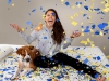Girl on Bed with Dog and Confetti Commercial Photography