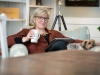 Lady with Coffe Cup and Ear Buds